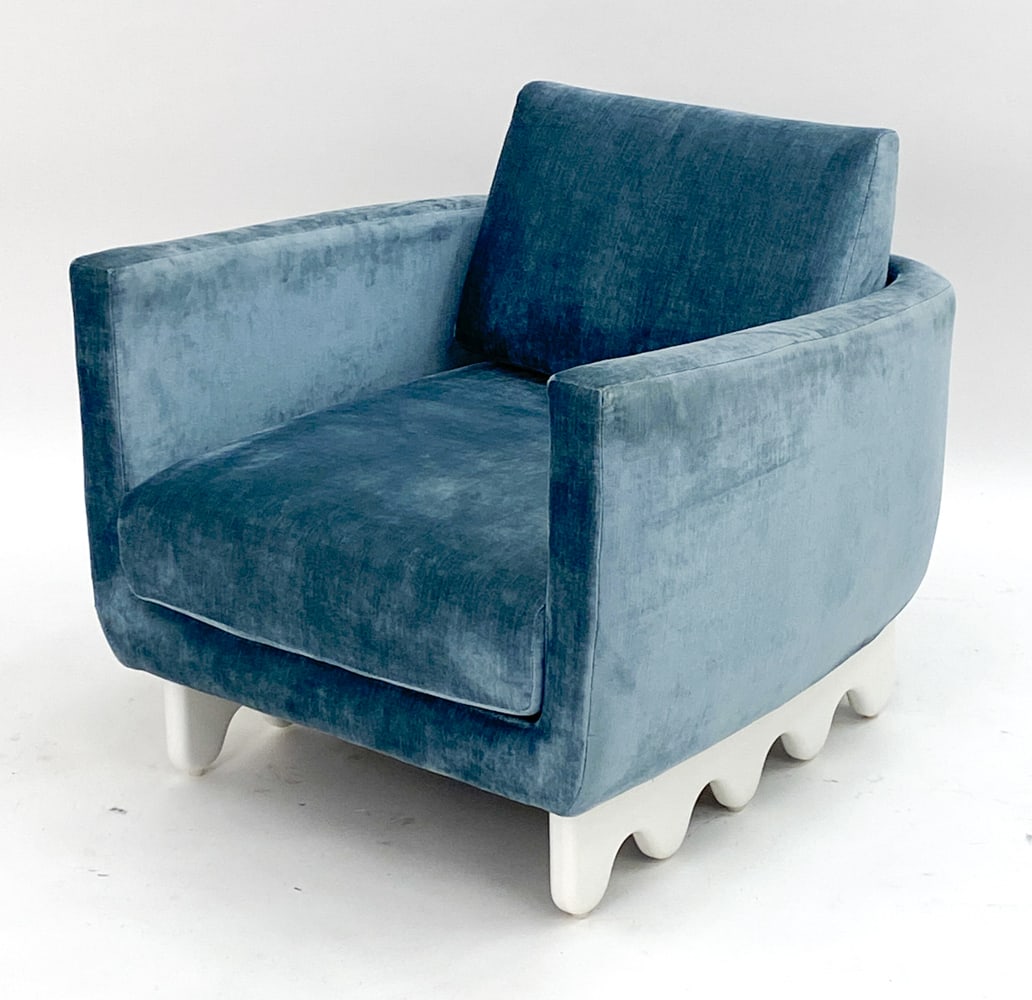 JONATHAN ADLER STYLE VELVET LOUNGE CHAIR: Blue velvet upholstery with flow form legs/feet. Tagged underneath cushion. Dimensions: H 22.5" x W 29.5" x D 32.5" x SH 15" Condition: Very light surface wear to feet.