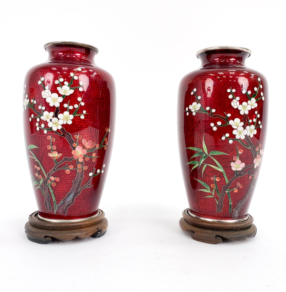 (2) JAPANESE CLOISONNE AKASUKE PIGEON BLOOD VASES: Japanese Cloisonne Akasuke pigeon blood vase with cherry blossom floral design. Dimensions: H 6.5" x W 3.5" Condition: Wear consistent with age. In great condition overall.
