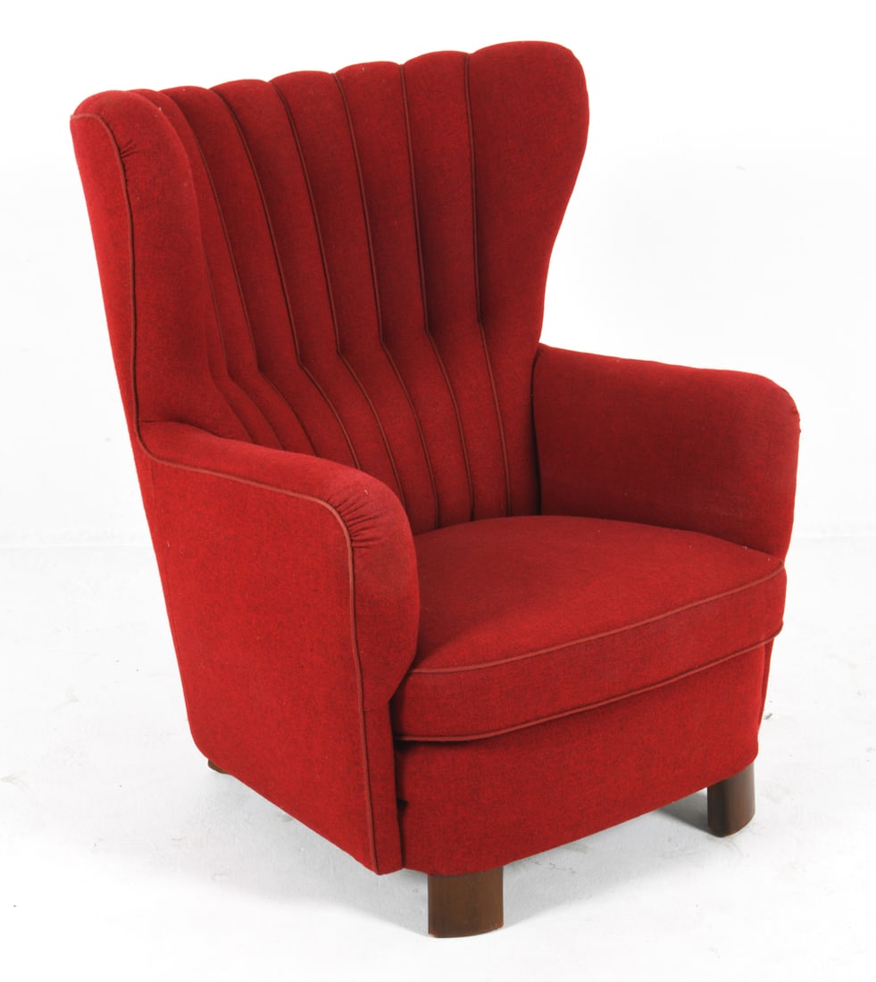 SLAGELSE MOBELVAERK DANISH WOOL LOUNGE CHAIR: Circa 1960s. Red-tone wool upholstery with channel back. Dimensions: H 39" x W 31" x D 27", SH 15" Condition: Rubbing and thinning to upholstery to armrests. Scuffs to wood legs. Presents well overall