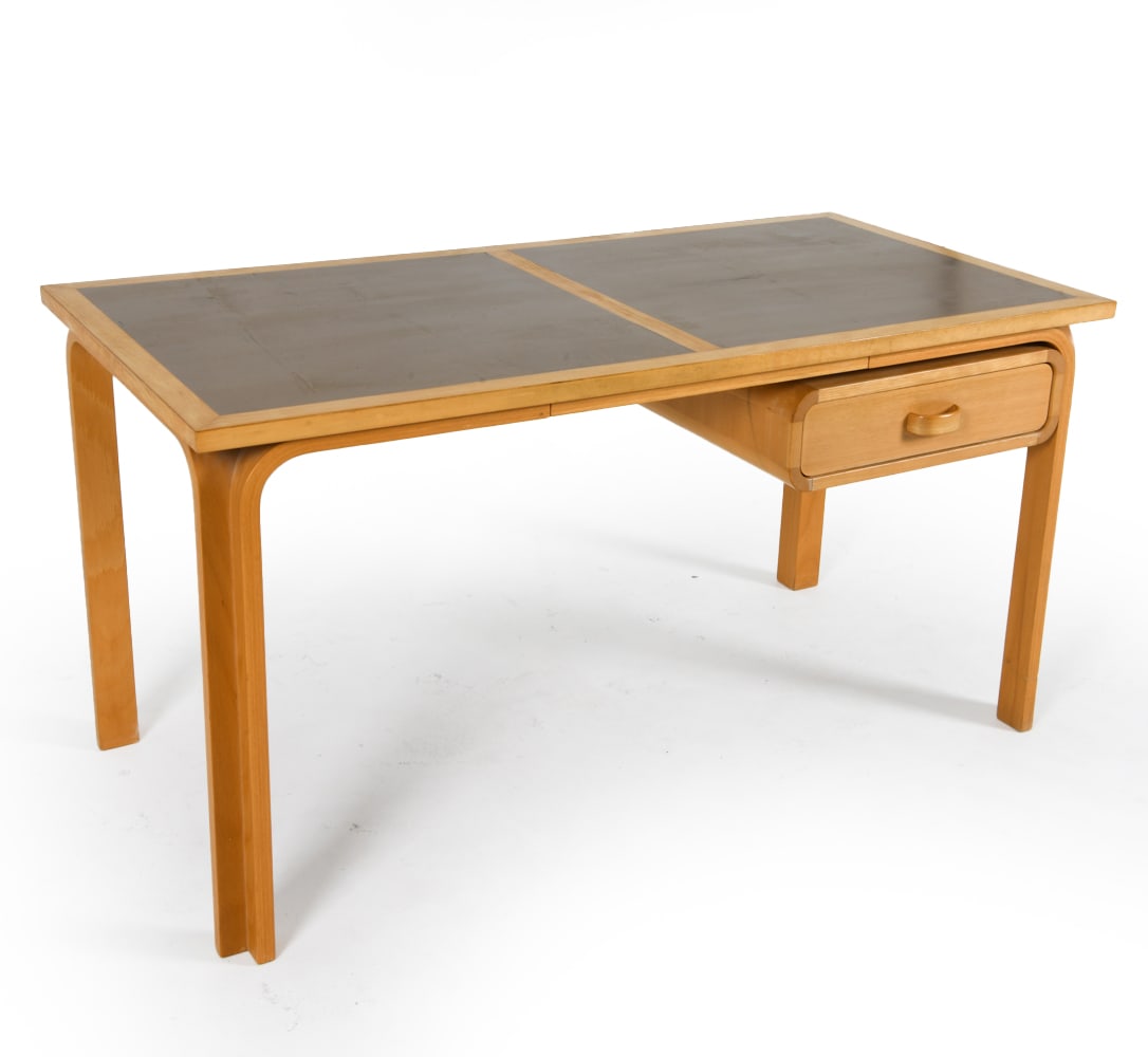 RUD THYGESEN & SORENSEN BEECH DESK C. 1970S: Magnus Olesen labels to underside. Waterfall legs. Dimensions: H 28.5" x W 55" x D 28.25" Condition: Scattered surface scratches. Rubbing and marks to edges.