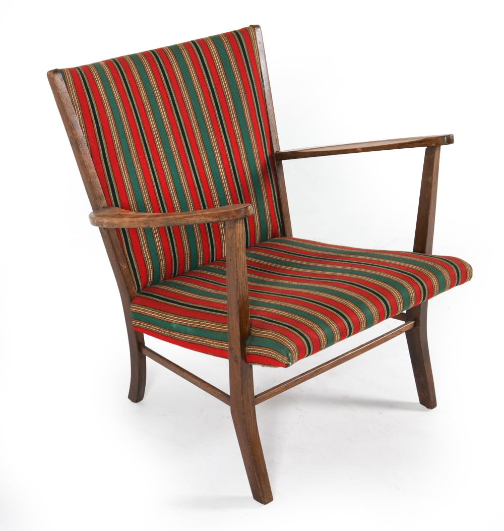 MID-CENTURY DANISH TEAK & WOOL LOUNGE CHAIR: Green & red-tone wool upholstery with sculpted armrests. Dimensions: H 31.5" x W27.5" x D23", SH 15" Condition: Moderate soiling, scuffs, rubbing and marks to armrests. Minor blemishes to wool upholst