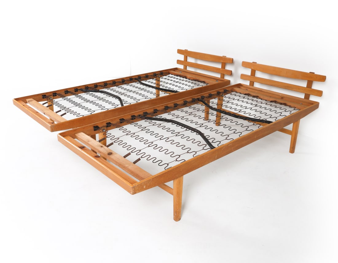 PAIR MID-CENTURY DANISH OAK DAYBEDS C. 1970S: Dimensions: H 23" x W 32.5 x D 78" Interior W 31.25" x D 77" Condition: Moderate rubbing and scuffs to bed frames. Wear consistent with age and use.