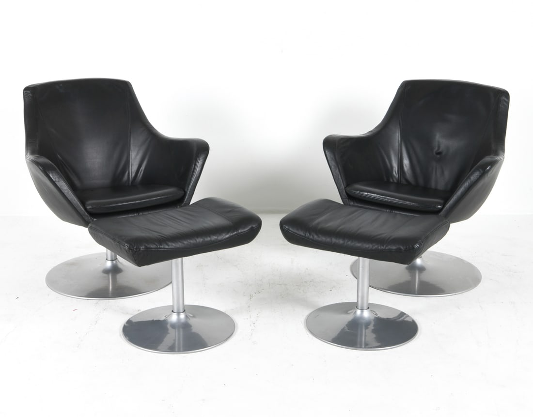 BOLIA LEATHER LOUNGE CHAIRS C. 1970S: Black-tone leather upholstery. Chairs on swivel bases. Dimensions: H 31" x W 28.5" x D23", SH 17" Ottoman: H 17" x W 21" x D 15" Condition: Scattered indentations to leather on both chairs. Light scuf