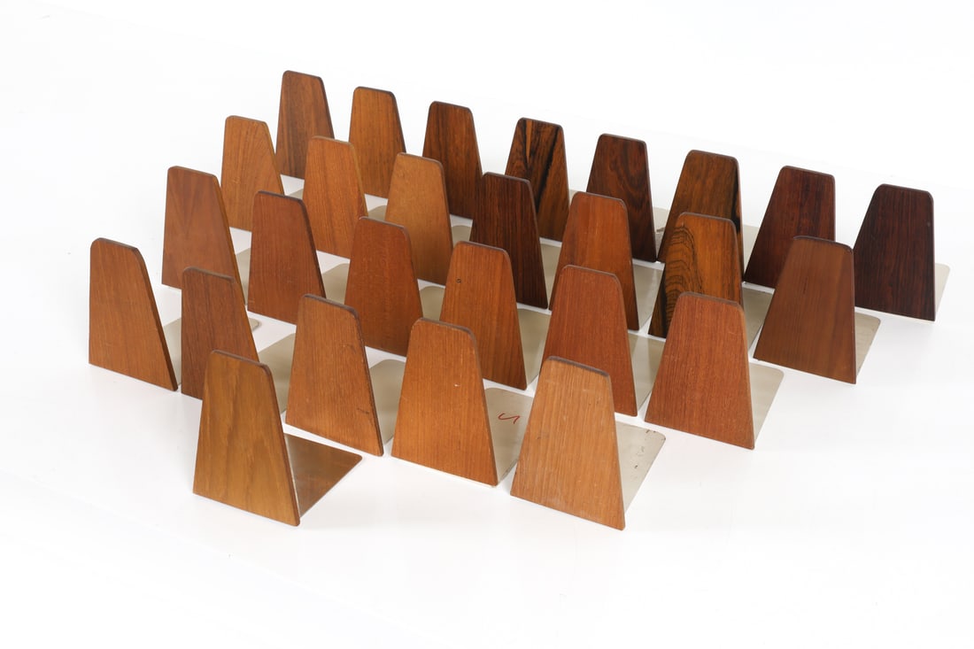 KAI KRISTIANSEN DANISH TEAK & ROSEWOOD BOOKENDS: Dimensions: H 5.5" x W 3.5" x D 6". Condition: Minor scuffs and scratches to teak and metal. Wear consistent with age and use.