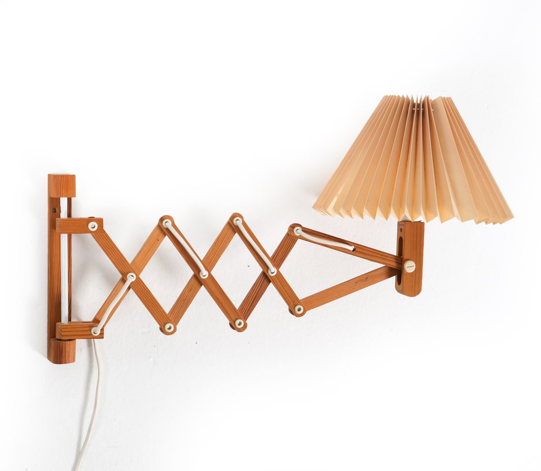 DANISH PINE SCISSOR LAMP SCONCE C. 1970S: Dimensions: H 11.75" x W 11" x D (max) 26". Condition: Wiring untested, European plug. Minor losses to shade. Wear consistent with age and use.
