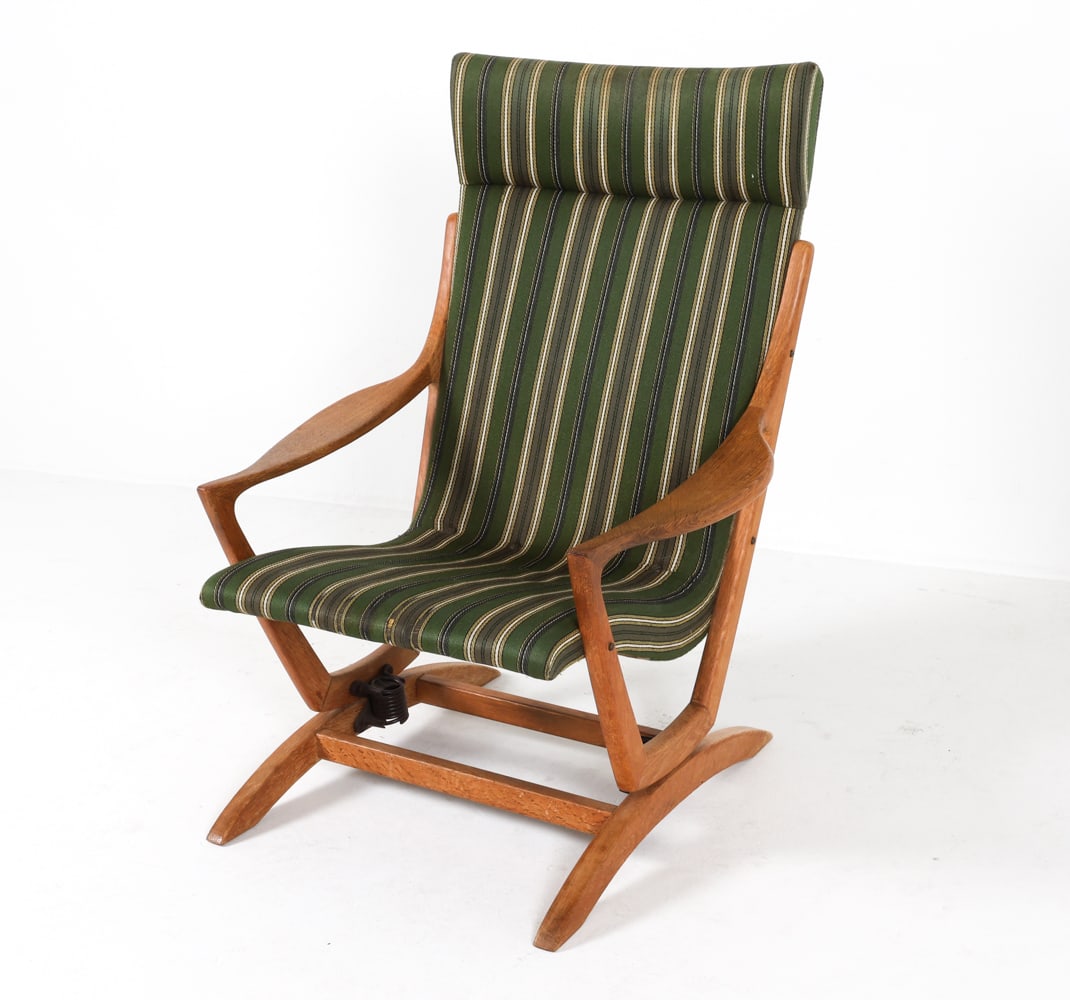 DANISH OAK & WOOL PLATFORM ROCKING CHAIR C. 1960S: Oak rocking or gliding chair with green striped wool upholstery. Denmark, circa 1970s. Dimensions: H 39" x W 21" x D 27" x SH 15.25". Condition: Few water spots to frame. Minor scuffs and dings. Missi
