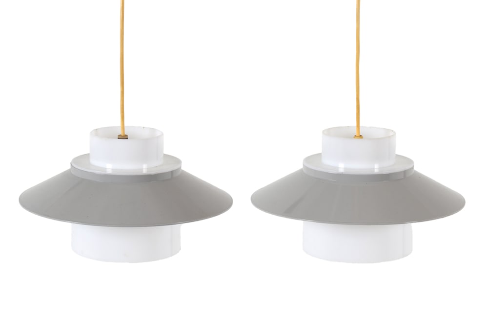 PAIR OF LYFA SAUCER PENDANT LIGHTS C. 1970S: Pair of plastic saucer pendant lights from Lyfa. Tagged to one inside near bulb socket. Dimensions: H 7.5" x Dia. 10.75". Condition: Wiring untested. Few scuffs and scratches. Wear consistent with age