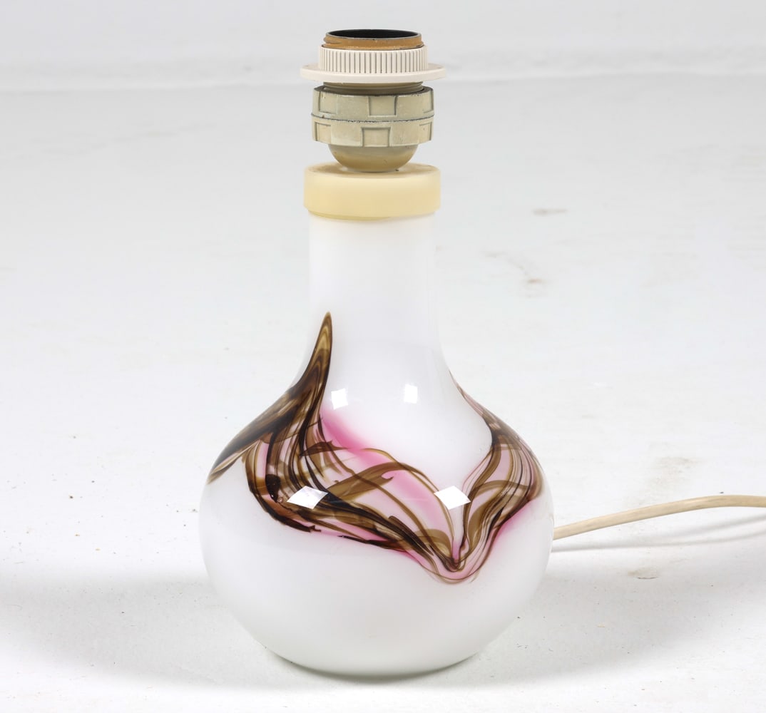 MICHAEL BANG HOLMEGAARD GLASS TABLE LAMP: Opaline glass table lamp with abstract design. Designed by Michael Bang for Holmgaard. Denmark, circa 1980s. Dimensions: H 10.5" x Dia. 5.75". Condition: Wiring untested, European plug. Remnant sticke