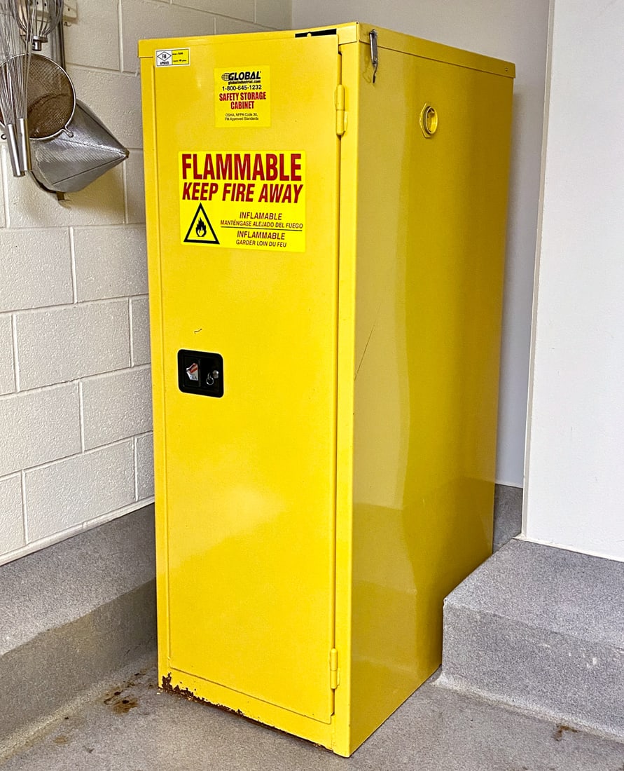FLAMMABLE SAFETY STORAGE CABINET: 3 adjustable shelves, meant to contain flammable material. Model number BJ60, capacity 60 gallons, FM approved. Includes key. Dimensions: H 65.25" x W 24" x D 34.75" Condition: Minor soiling, oxidizin