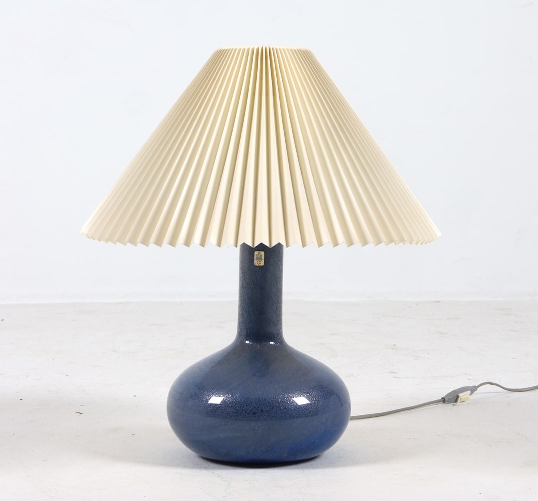 SIDSE WERNER HOLMEGAARD 'TROLL 2' TABLE LAMP: Glass table lamp designed by Sidse Werner for Holmegaard. Tagged under base and to side of neck. Denmark, circa 1970s. Dimensions: H 21.5" x Dia. 18.5". Condition: Wiring untested, cord cut. Minor scu