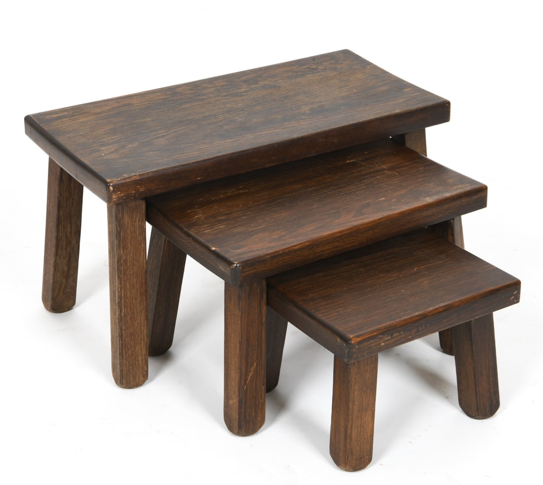 DUTCH STAINED OAK NESTING TABLES C. 1950S: Set of (3) oak nesting tables with a dark stained finish in a Dutch brutalist style. Apparently unmarked. Dimensions: (Largest) H 13.5" x W 23.5" x D 11.5" Condition: Few legs are loose, light surface