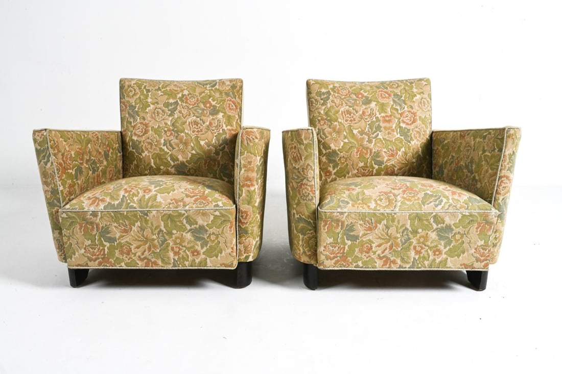 PAIR OF BOESEN STYLE CHAIRS BY SLAGELSE MOBELVAERK: Steeped in Danish design heritage, this captivating pair of early mid-century modern armchairs, crafted by Slagelse Mobelfabrik in the 1940s, exudes timeless quality. Their classic aesthetic and focus