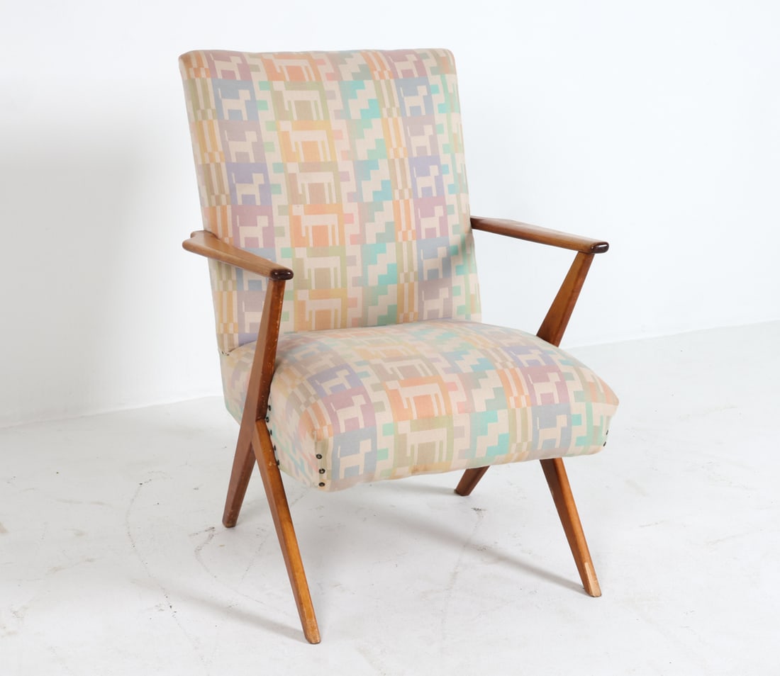 BENGT RUDA STYLE SWEDISH BEECH LOUNGE CHAIR: Beech frame with patterned fabric upholstery. Sweden, circa 1960s. Dimensions: H 34" x W 25.5" x D 30" x Sh 16.25". Conditions: Small dings and rubs to arms and legs. Minor losses to left legs. Wear c