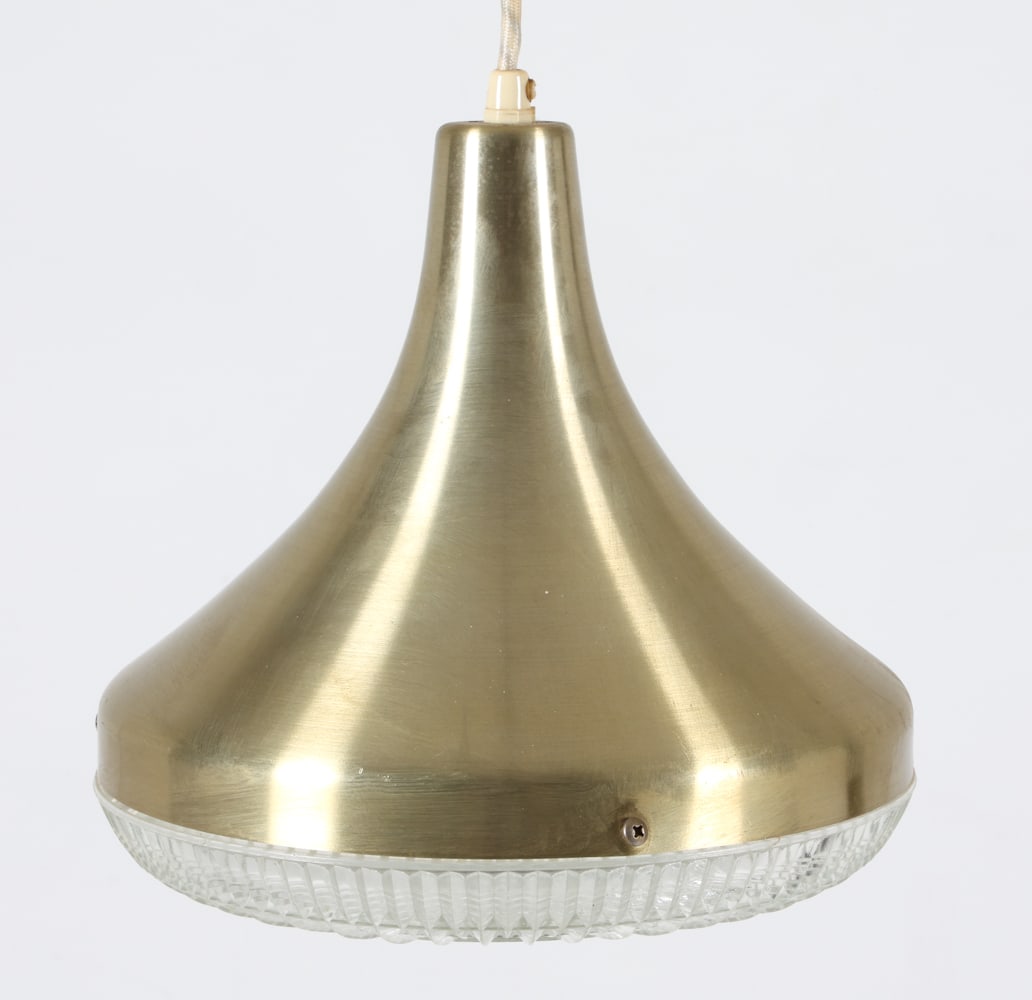 DANISH BRASS & GLASS PENDANT LIGHT C. 1970S: Brushed brass finish to metal shade with textured glass underside. Dimensions: H 9.5" x Dia. 9". Condition: Wiring untested. Minor scuffs to metal and glass. Wear consistent with age and use.
