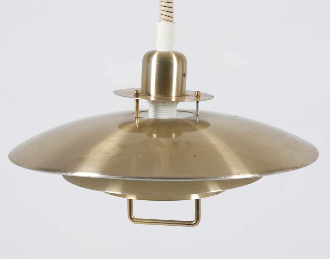 BELID 'PRIMUS' DANISH PENDANT LIGHT C. 1970S: Saucer pendant light with handle and 'rise & fall' pulley mechanism for height adjustment. Brass toned finish to metal. Dimensions: H 11" x Dia. 16.25". Condition: Wiring untested. Few dents to shades