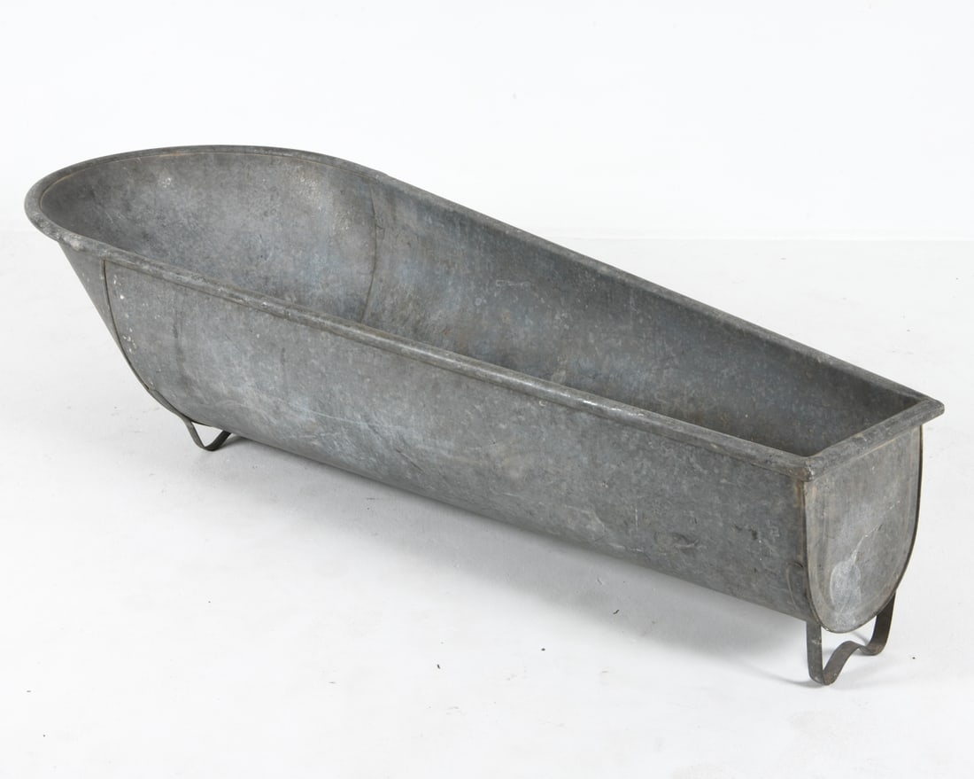 SCANDINAVIAN GALVANIZED STEEL TUB: Dimensions: H 17" x W 25.5" x D 66.25" Condition: Blemishes, oxidation and scuffs throughout, consistent with age and exposure.