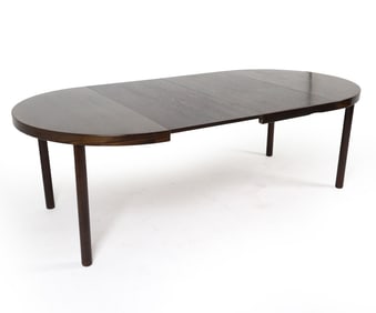 ATTR. KAI KRISTIANSEN OAK EXTENDING DINING TABLE