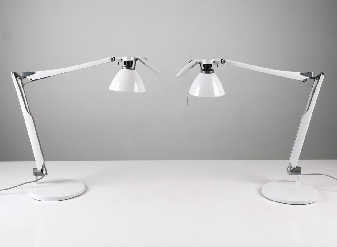 PAIR OF LUCEPLAN 'FORTEBRACCIO' ARCHITECT LAMPS: Designed by Alberto Meda and Paolo Rizzatto for Luceplan. Marled to stand and inside of shade. Italy, circa 1980s. Dimensions: Approx. H 21" x W 29" x Dia. Base 9.25". Condition: Wiring untested, Euro