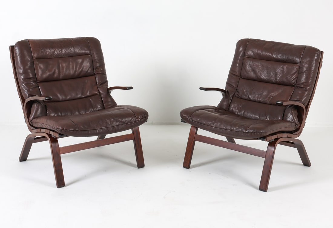 MILJO RANGE FARSTRUP BEECH & LEATHER LOUNGE CHAIRS: Beech bentwood frames. Brown leather upholstery. Design by Miljo Range for Farstrup, Scandinavian, circa 1970s. Dimensions: H 32" x W 27" x D 30" x SH 16". Condition: Minor scuffs and scratches to fra