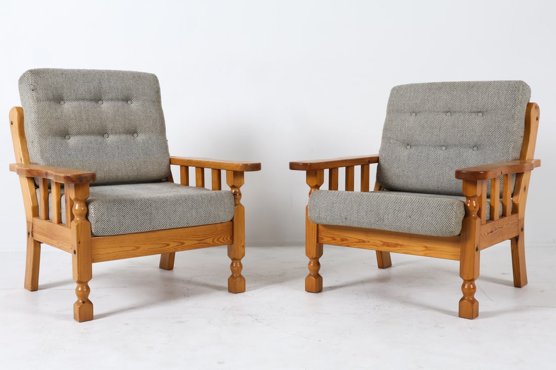 HENNING KJAERNUIF STYLE PINE LOUNGE CHAIRS C.1970S: Pine frames with grey wool upholstery in the style of Henning Kjaernuif. Denmark, circa 1970s. Dimensions: H 34" x W 24.5" x D 27.5" x SH 15". Condition: Slight tobacco odor to fabric. Scuffs and scra