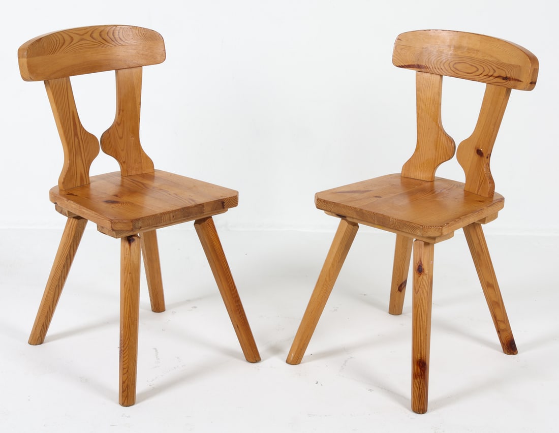PAIR OF SWEDISH PINE DINING CHAIRS C. 1970S: Dimensions: H 32" x W 15" x D 16.5" x SH 17.5". Condition: Small dings and scratches throughout. Wear consistent with age and use. DMR071