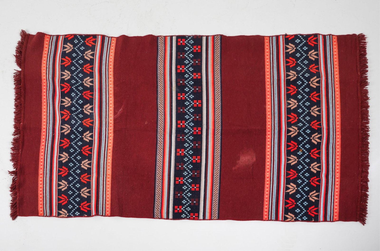 TURKISH KILIM AREA RUG C. 1960'S: Dimensions: L 81" x 47" Condition: Slight blemish to rug. Slight animal smell. Cleaning recommended.