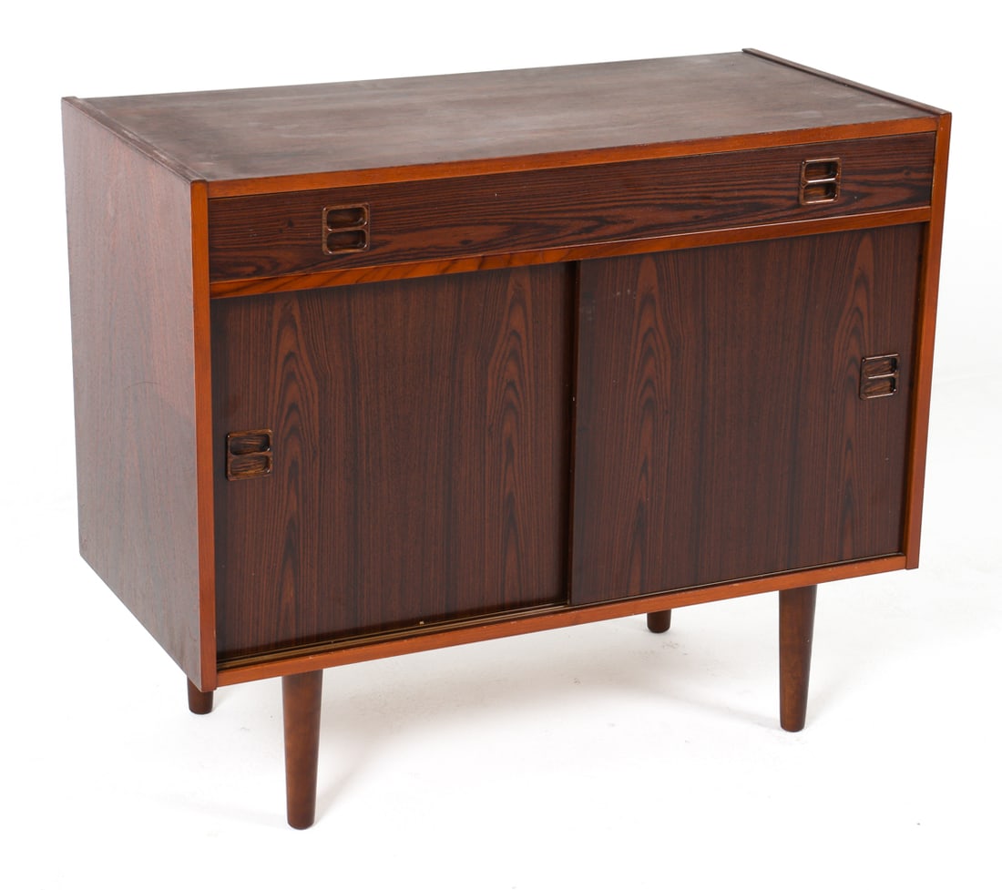 DANISH ROSEWOOD CABINET C.1960S: Rosewood cabinet with sliding doors. Adjustable shelves. Denmark, circa 1960s. Dimensions: H 29" x W 34.75" x D 16.75". Conditions: A scattering of minor dings and rubs. Wear consistent with age and u