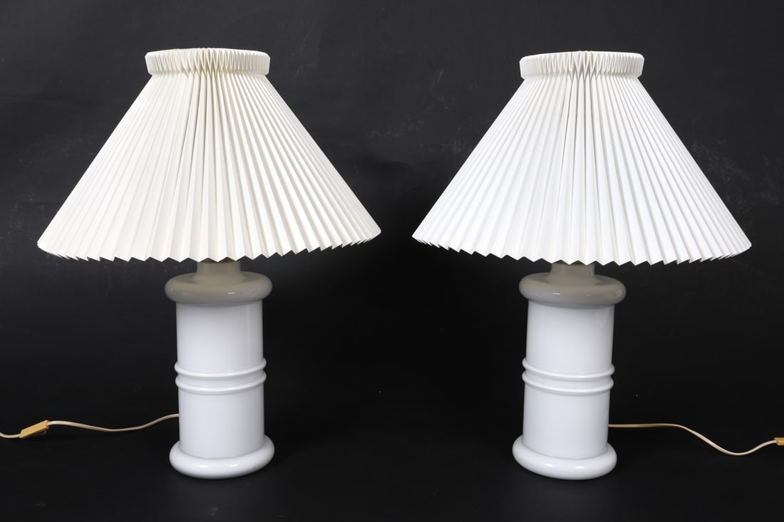 PAIR HOLMEGAARD PHARMACIST TABLE LAMPS C. 1970S: "APOTEKER" lamp designed by Sidse Werner for Holmegaard. White milk glass bodies with Le Klint shades. Marked under the base. Denmark, circa 1970s. Dimensions: w/ shade H 23" x Dia. 18". Body Dia. 5".