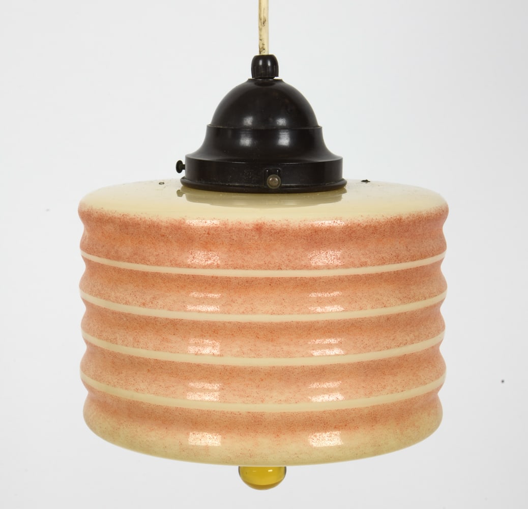 ART DECO STYLE GLASS PENDANT LIGHT FIXTURE: Feature a pink diffuser with a reeded surface to glass. Apparently unmarked. Scandinavian, circa 1940s. Dimensions: (Fixture) H 9" x Dia 7.75" Condition: Untested, cord cut. Light surface marks to gla