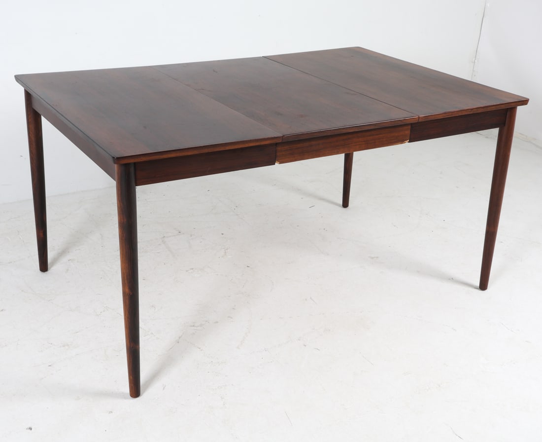 SVEND LANGKILDE DANISH ROSEWOOD DINING TABLE: Labeled "LangKilde" underneath leaf Dimensions: H 28.5" x W 37.5" x D 37.5" (Leaf: W 19") Conditions: Wear consistent with age and use,
