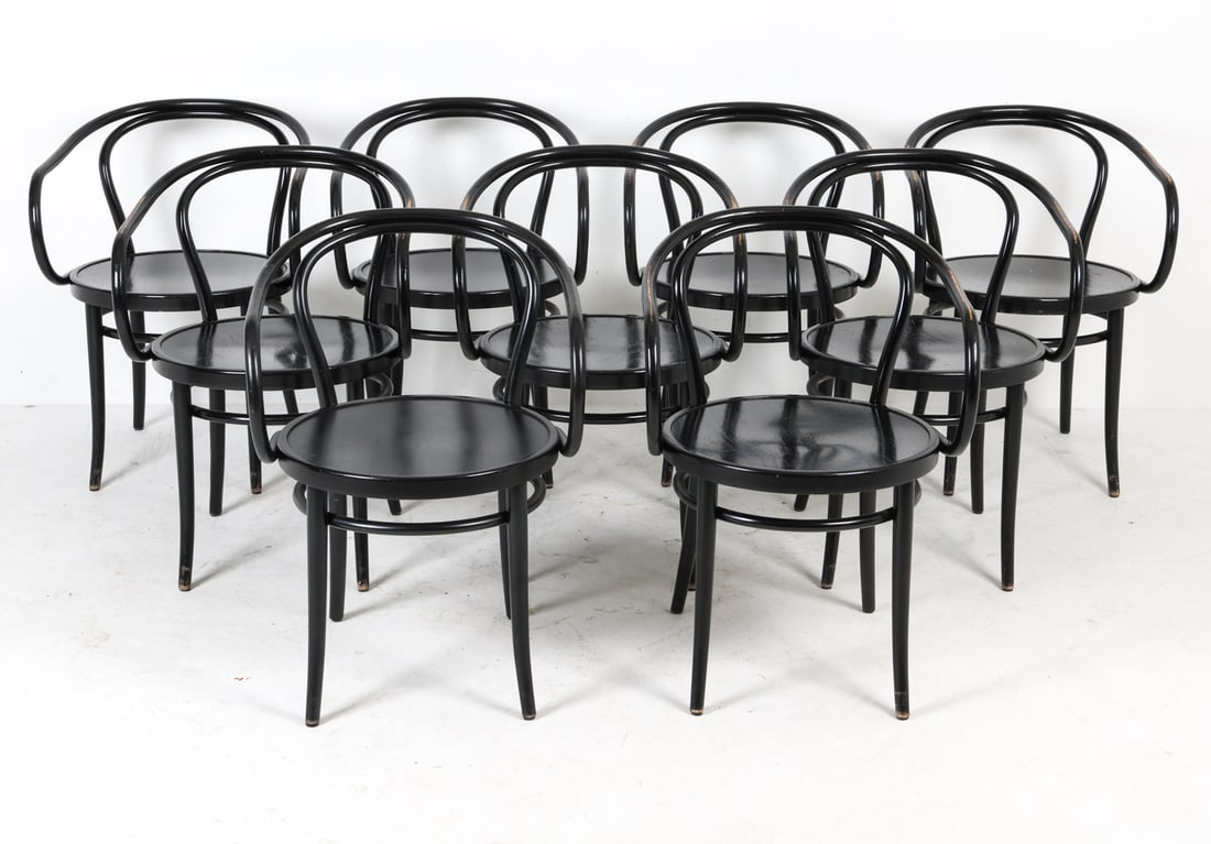 (9) THONET 'MODEL 30' DINING CHAIRS: Designed by Michael Thonet. Produced by Ton. Tagged underneath. Dimensions: H 31" x W 22" x D 21" S.H. 18". Condition: Minor scratches, rubs and losses to finish. One chair missing bolt to armrest.