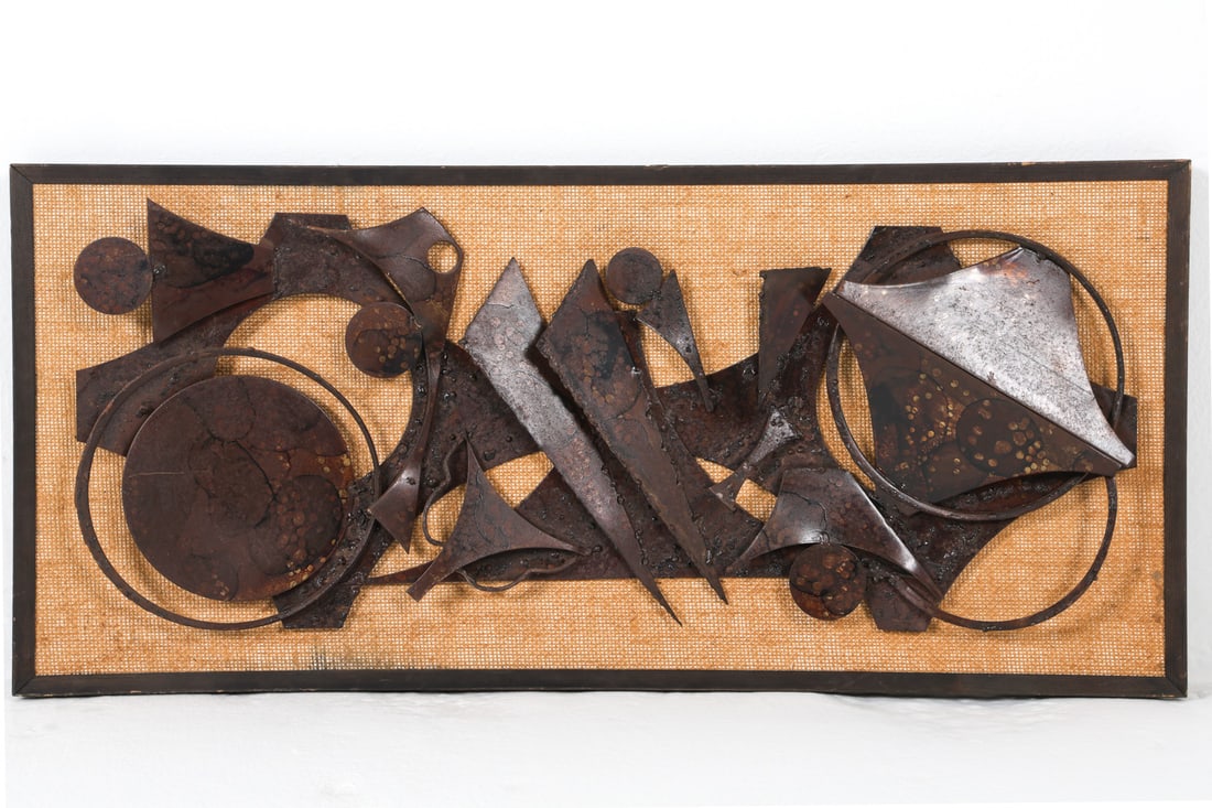 PER GUDMUND JENSEN BRUTALIST METAL WALL SCULPTURE: Abstract metal sculpture mounted to wall display. Information on the back. Denmark, circa 1970s. Dimensions: H 16.5" x W 36.5". Condition: Minor scuffs to frame. Wear consistent with age and display. 