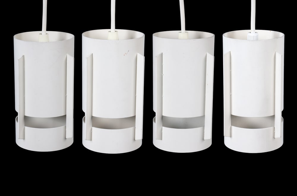 DARO MIKRON DANISH STEEL PENDANT LIGHT GROUP: Set of (4) pendant lights. Label near socket. Denmark, circa 1980s. Dimensions: Each H 5.5" x Dia 4". Condition: Wiring untested. Minor scuffs and scratches. Wear consistent with age and use. E009