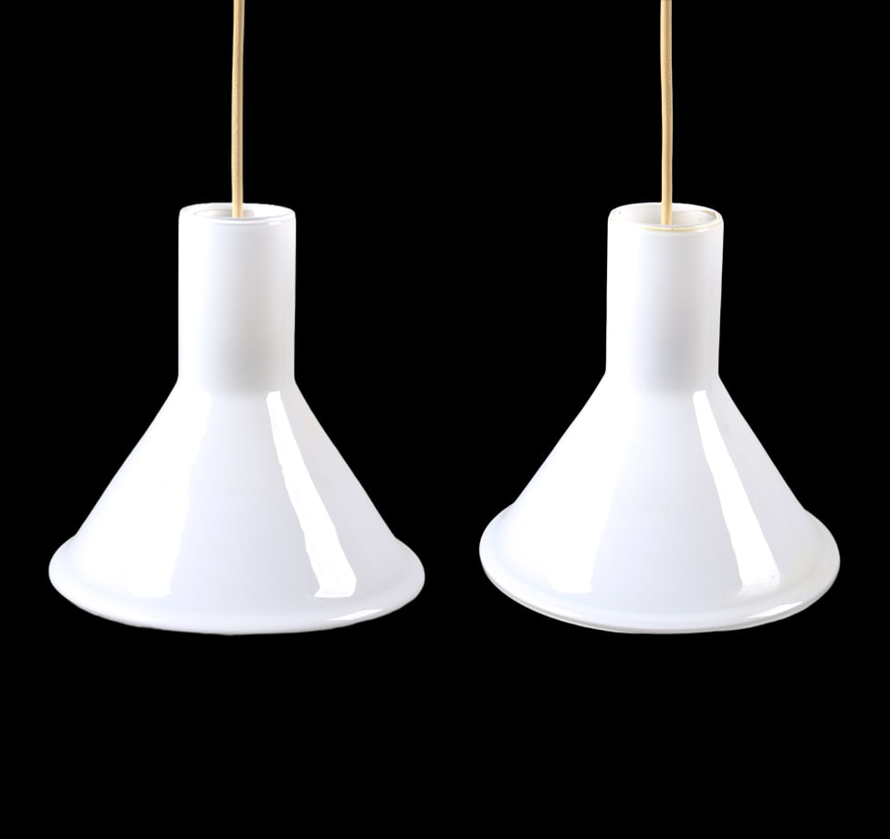 PAIR OF MICHAEL BANG HOLMEGAARD PENDANT LIGHTS: Model 'Etude'. Opaline glass shades. Denmark, circa 1970s. Dimensions: H 8.25" x Dia. 8.25". Condition: Wiring not Tested. No issues to note. Wear consistent with age and use. E185