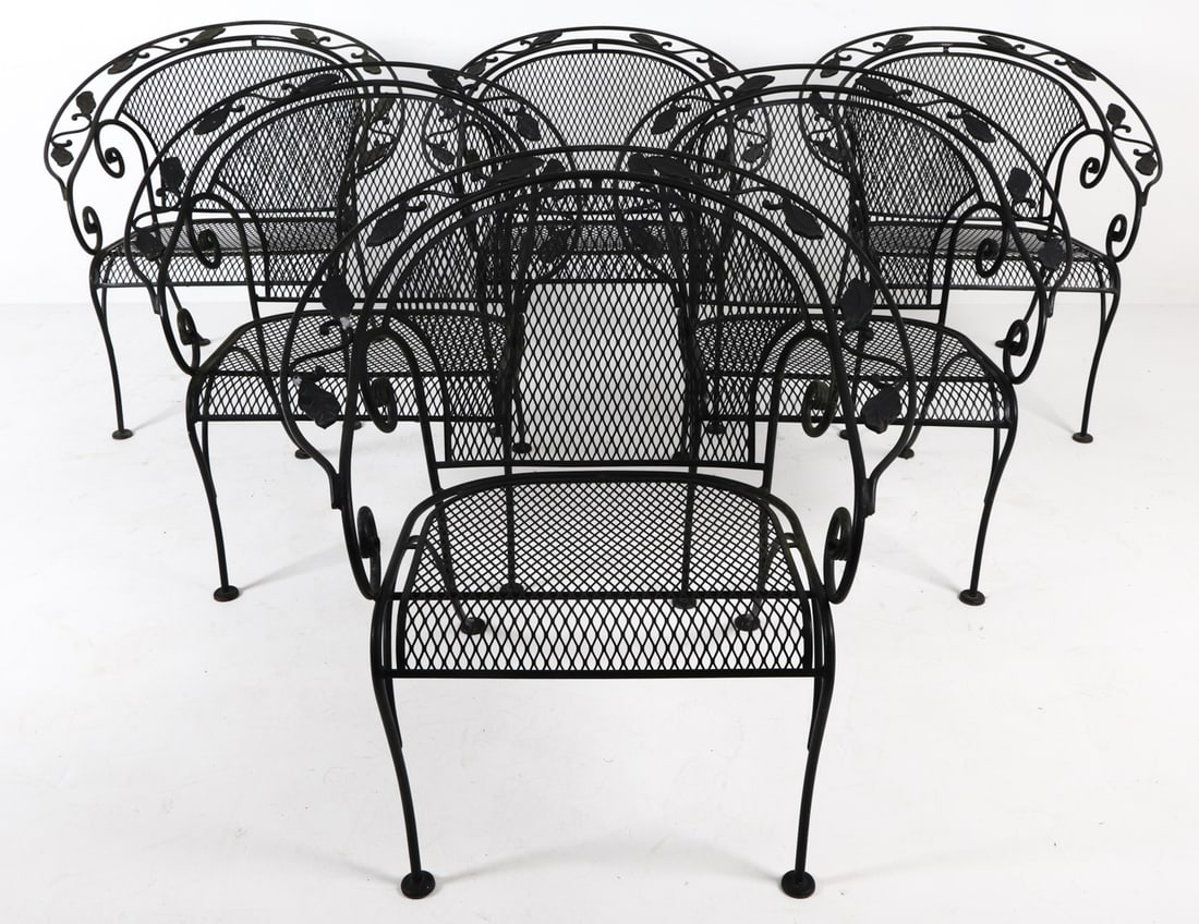(6) O W LEE BARREL LEAF OUTDOOR PATIO ARMCHAIRS: Set of (6) wrought iron patio chairs. Late 20th century. Dimensions: H 28.5" x W 30" x D 22.5" x SH 15". Condition: Scuffs and scratches, mild surface soiling. Wear consistent with age and outdoor use