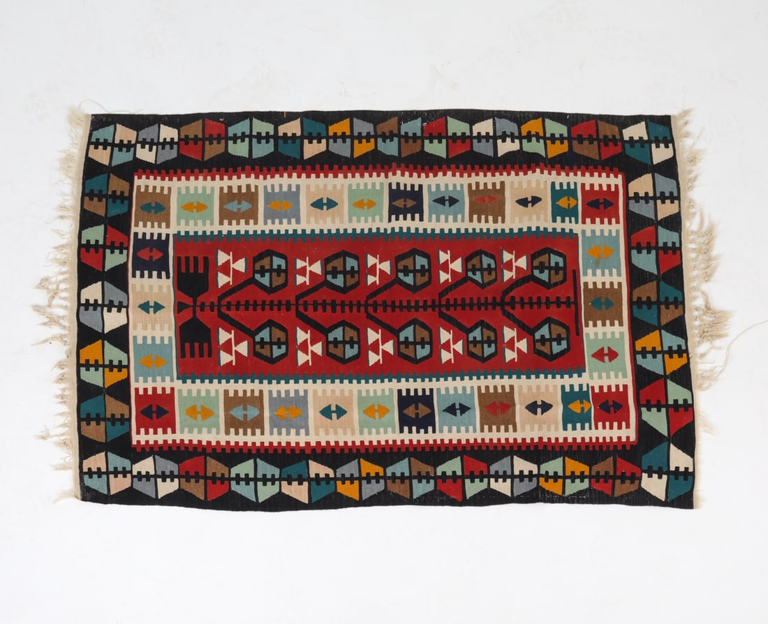 VINTAGE TURKISH KILIM RUG: Dimensions: L 84" x W 48.5". Condition: Some sun fading, wear consistent with age and use.