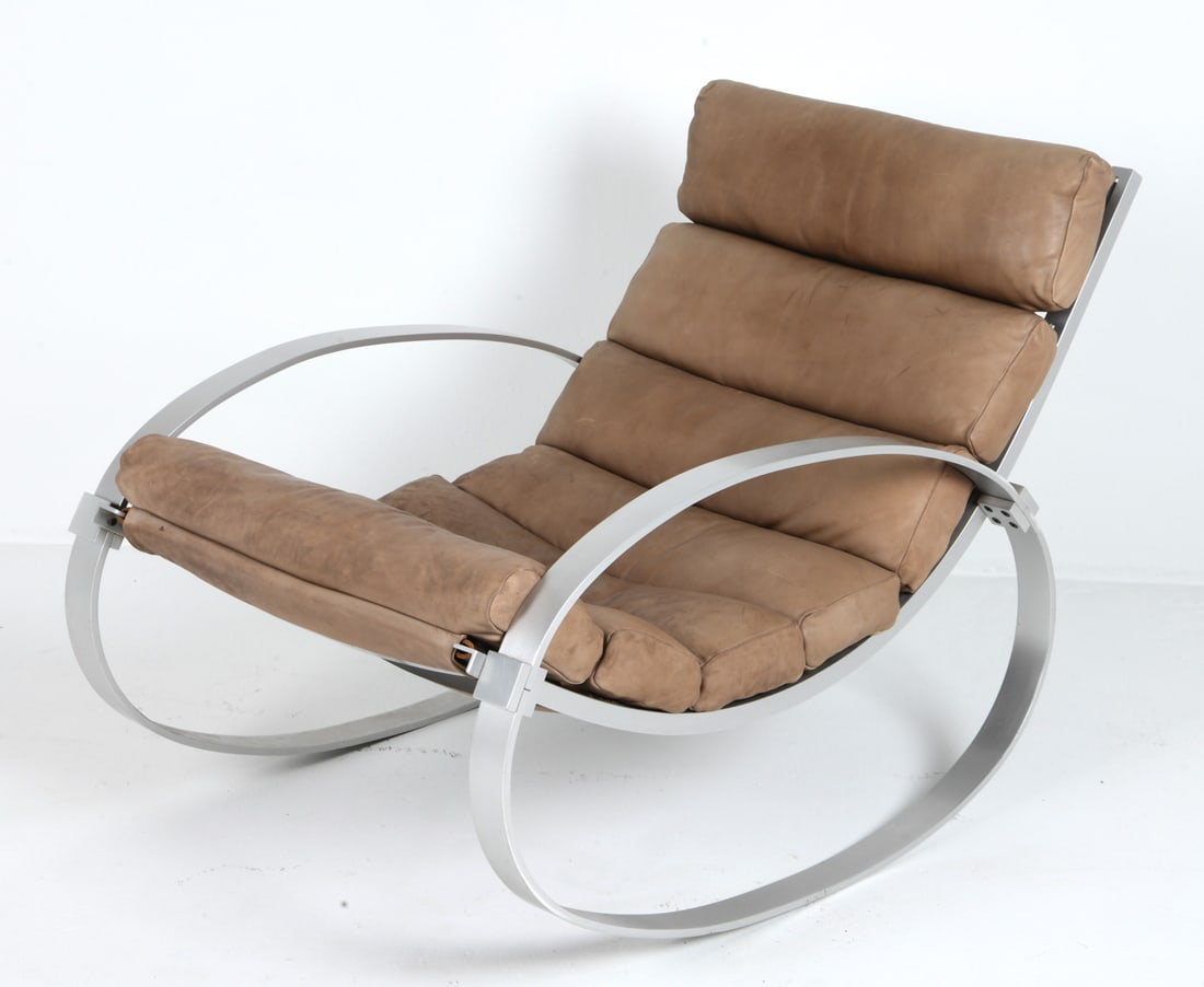 HANS KAUFELD GERMAN LEATHER ROCKING CHAIR C. 1970S: Leather and aluminium rocking chair by Hans Kaufeld. Apparently unmarked. Germany, circa 1970s. Dimensions: H 32" x W 28" x D 42" SH 15" Condition: Minor Scuffs and soiling throughout leather seat and