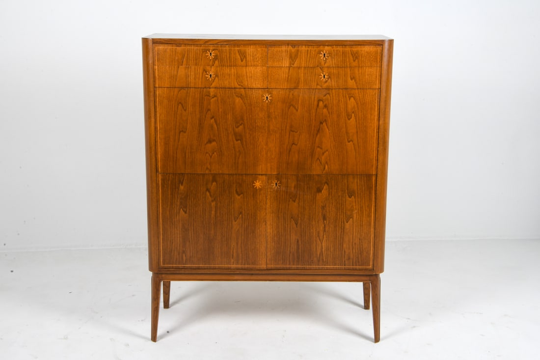 ATTR. BODAFORS SWEDISH WALNUT HIGHBOARD C. 1930S: Walnut front bar highboard with drawers and moving shelves attributed to Bodafors. Sweden, circa 1930s. Key is included. Dimensions: H 50.75" x W 39.25" x D 15.75" Conditions: Wear consistent with age