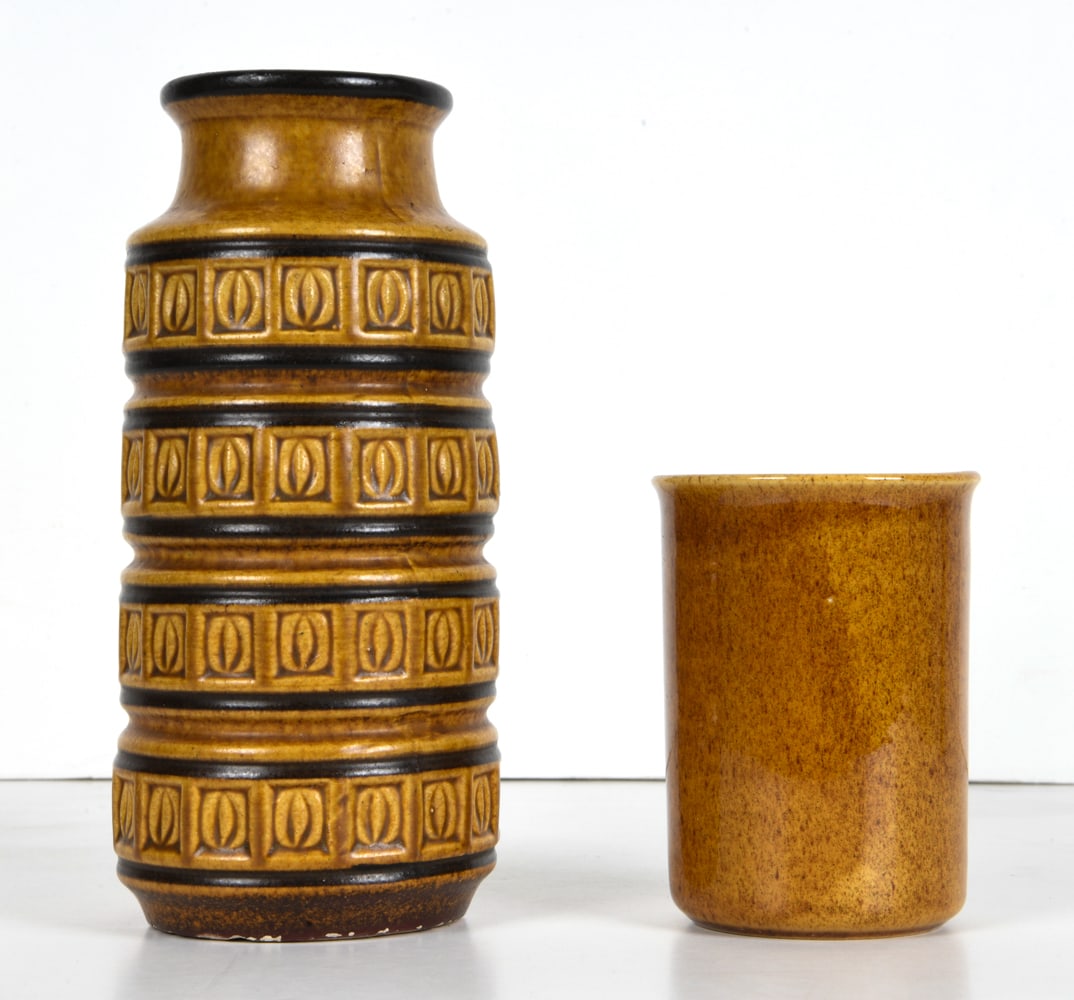 SCHEURICH KERAMIK & JIE GANTOFTA CERAMIC VASES: Larger Scheurich Keramik vase and smaller vase by JIE Gantofta, marked underneath. West germany and Sweden, circa 1970s. Dimensions: (Larger) H 9.25" x Dia 3.75" Condition: Small nicks to bottom of la