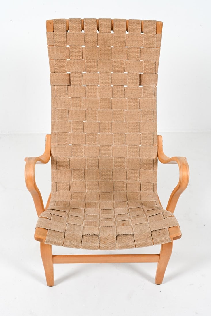 BRUNO MATHSSON BEECH 'EVA' LOUNGE CHAIR: This is an iconic chair known as the 'Eva' model, designed by Bruno Mathsson. This stunning chair, crafted in Sweden in the 1970's, embodies the timeless elegance and functionality of Scandinavian des
