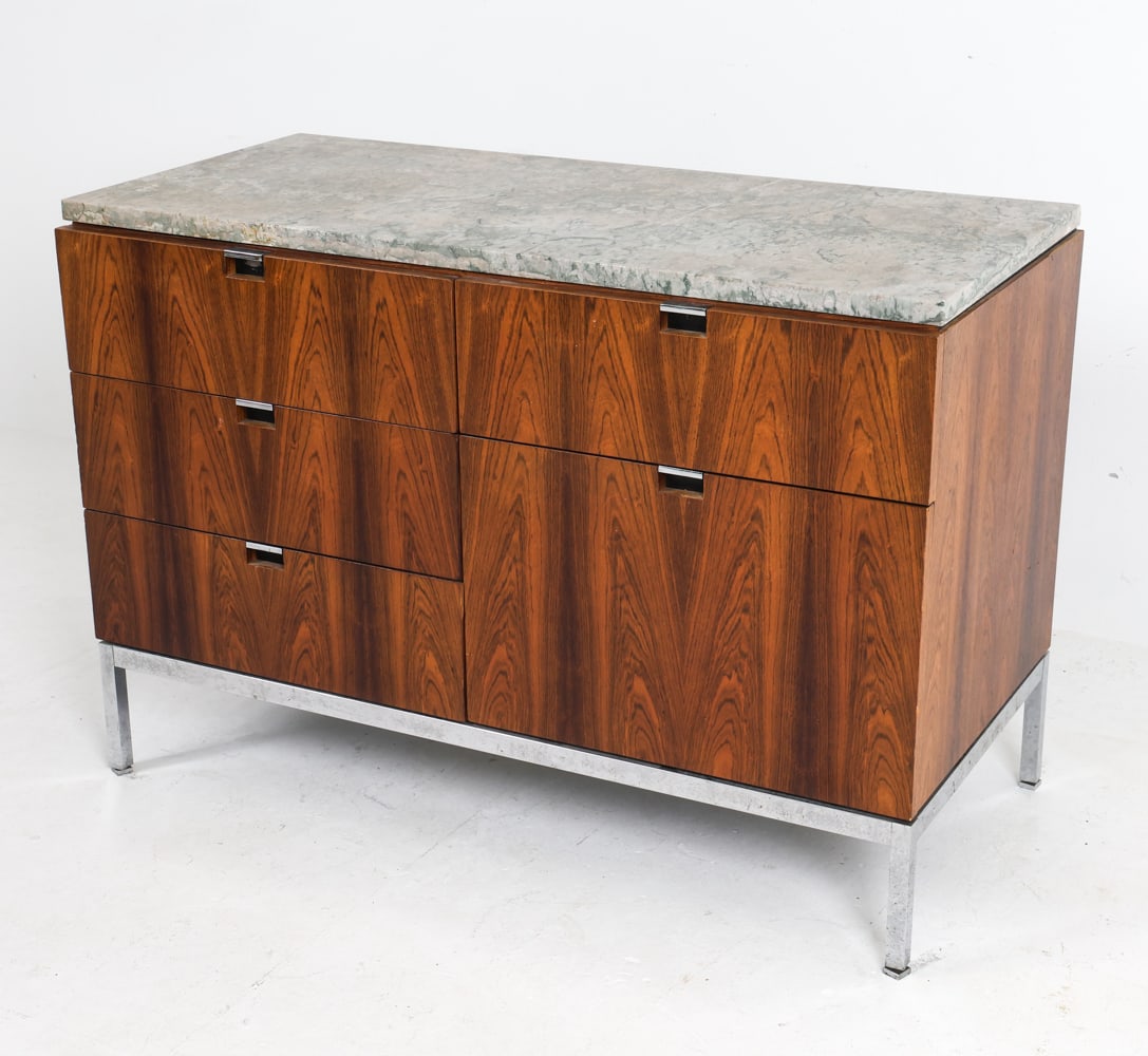 FLORENCE KNOLL ROSEWOOD EXECUTIVE OFFICE CABINET: Rosewood veneer with marble top. Chrome-plated steel legs with aluminum drawer pulls. Circa 1970s.Dimensions: H 25.5" x W 37.25" x D 18.5".Condition: Minor scuffs and dings to wood. Marble sits freely