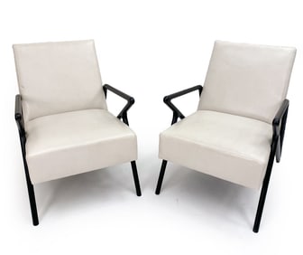 PAIR OF CONTEMPORARY VINYL LOUNGE CHAIRS