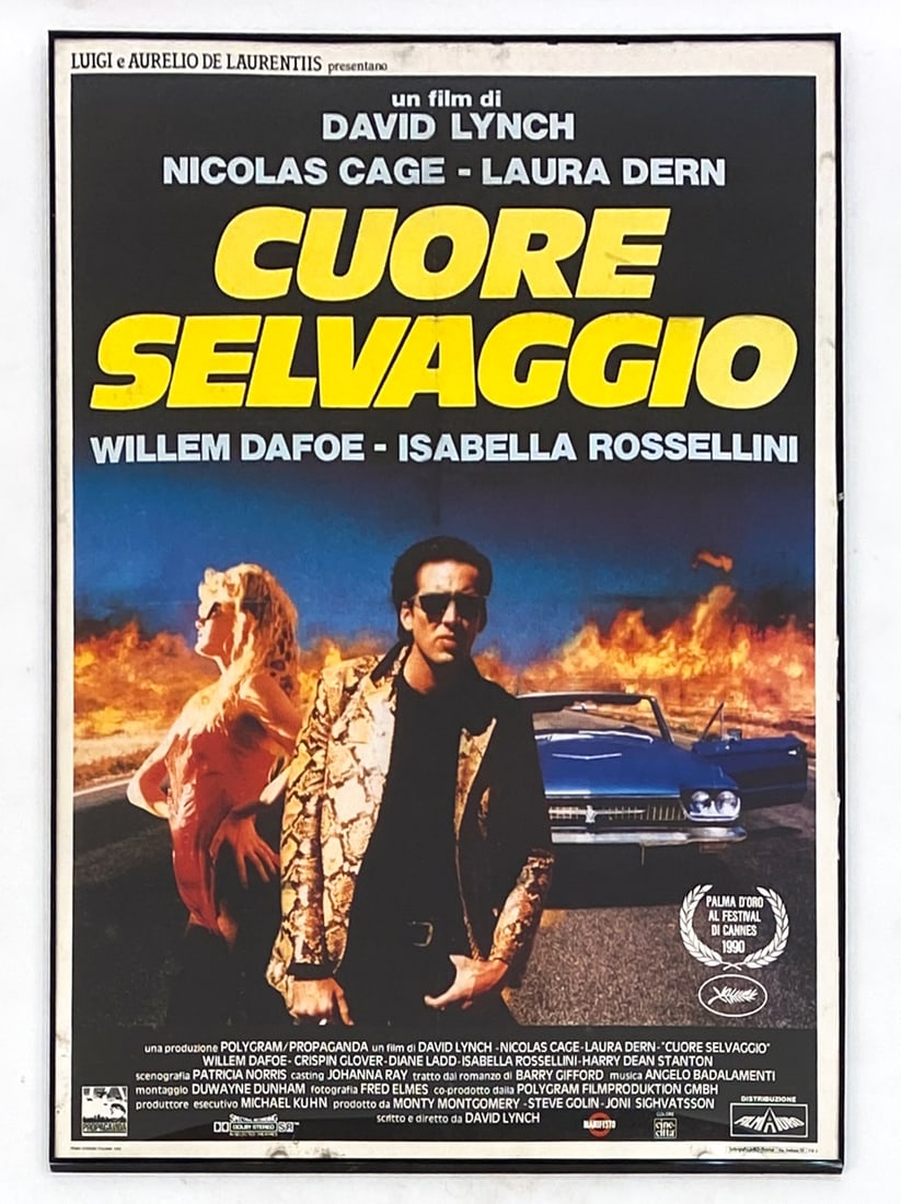 ITALIAN CUORE SELVAGGIO FRAMED MOVIE POSTER: Movie poster for Cuore Selvaggio (Wild at Heart) by David Lynch, movie features Nicolas Cage. Dimensions: H 55.25" x W 39" Condition: Wear consistent with age.
