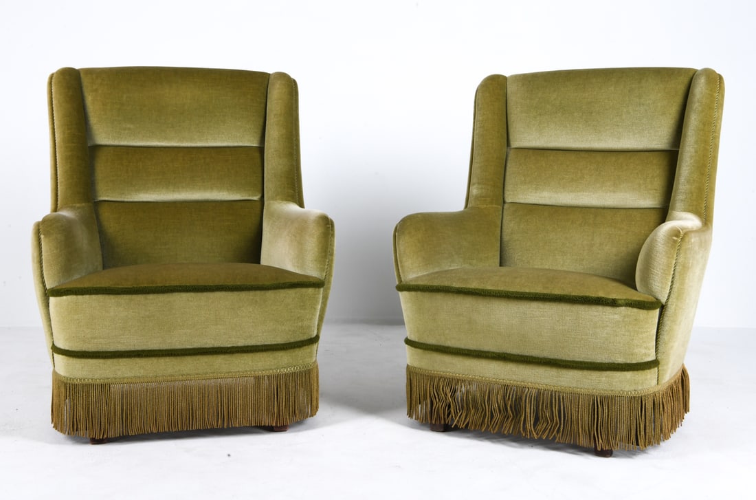 PAIR OF DANISH MOHAIR LOUNGE CHAIRS C. 1960S: Green mohair upholstery with corded trim. Denmark, circa 1960s. Dimensions: H 37" x W 28" x D 24" x Sh 14.5". Conditions: Wear consistent with age and use. Dings to legs.