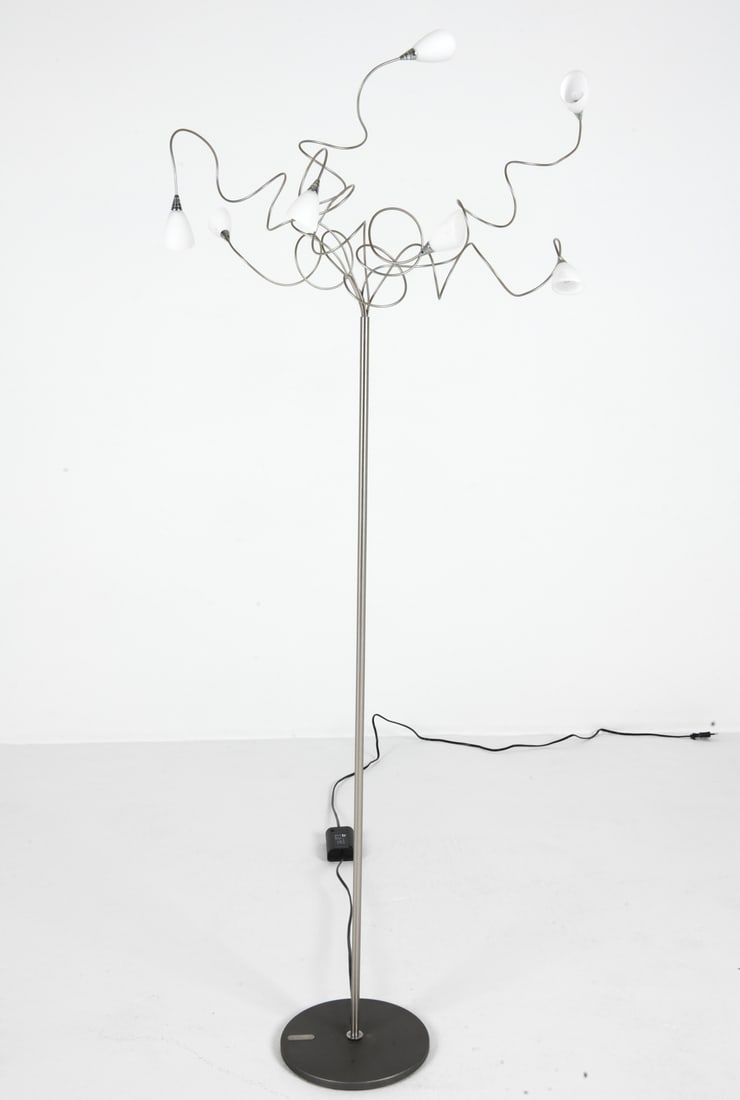 HERSTAL DANISH STRING 7 STEEL FLOOR LAMP: Steel floor lamp with (7) lights. Frosted glass shades. Tagged to base. Contemporary. Dimensions: H 57" x Dia. 27". Condition: Wiring untested, European plug. Minor scratches. Wear consistent with age