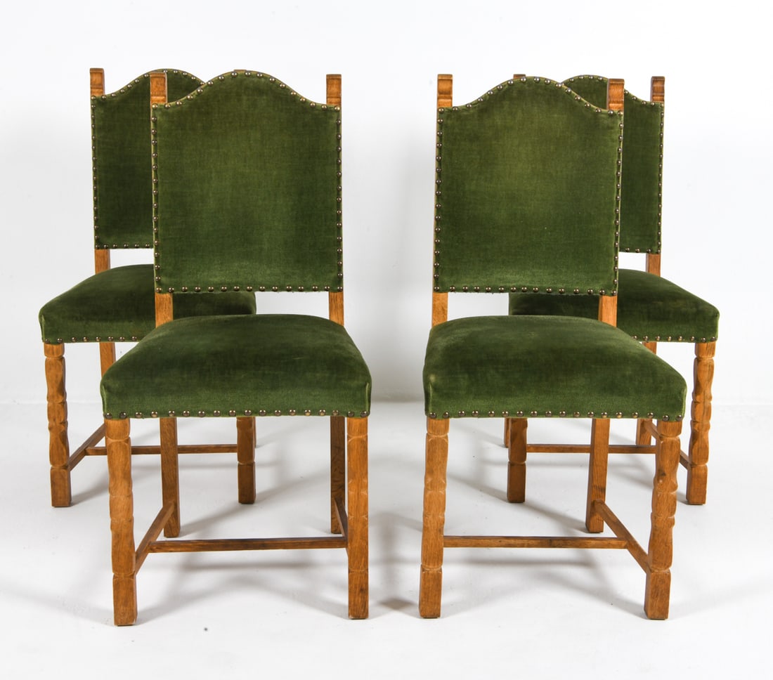 (4) HENNING KJAERNULF STYLE OAK DINING CHAIRS: Oak frames with turned legs and green mohair upholstery. Brass tacks accents. Denmark, circa 1970s. Dimensions: H 37.5" x W 15" x D 18" x SH 17.5". Condition: Minor scuffs and dings to wood. Wear cons