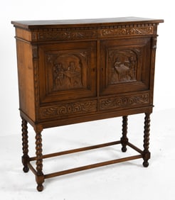 ATTR. EUGEN HOGLUND BAROQUE STYLE OAK CABINET