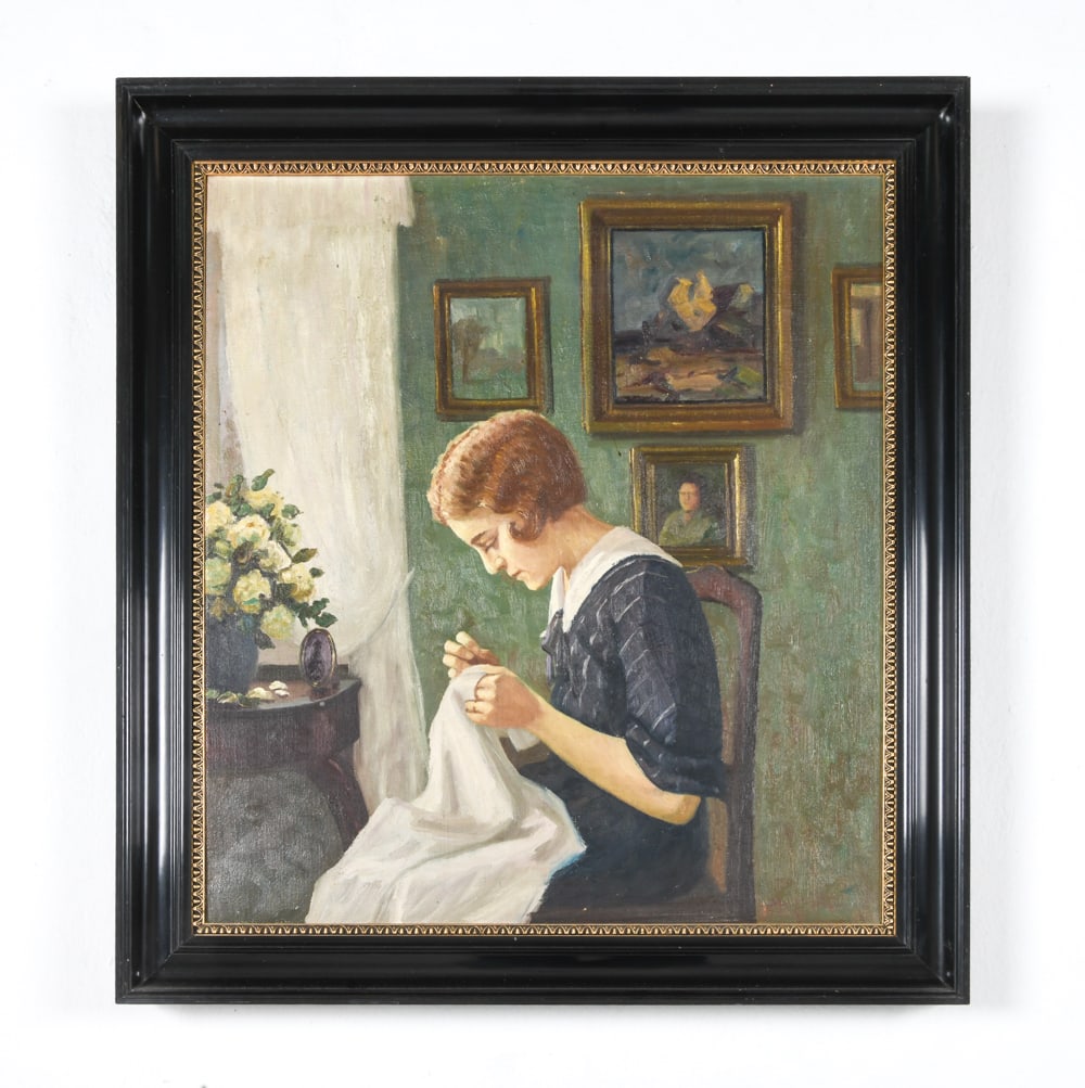 DANISH PORTRAIT OF A WOMAN SEWING O/C: Signed to lower right corner. Portrait of a lady sewing. Oil on canvas. Mid 20th century. Dimensions: Frame H 34.5" x W 32". Canvas H 29.5" x W 26.75". Condition: Minor scuffs to frame. Wear consisten