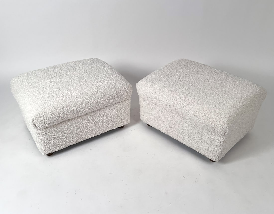PAIR OF SELIG OF MONROE FAUX SHEARLING OTTOMANS: Set of two faux shearling ottomans, with walnut legs Rectangular shape & Modernist style. Labeled underneath. Dimensions: H 16" x W 25" x D 19" Condition: Minor scuffs and signs of wear consistent wit