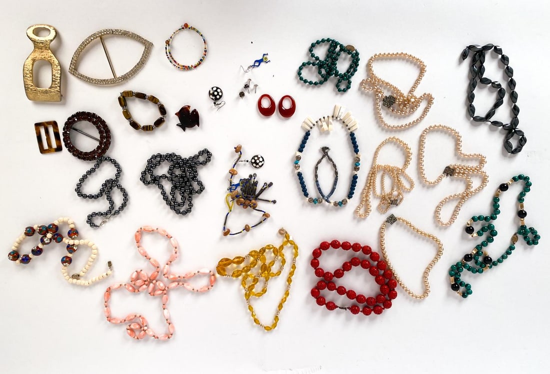 GROUPING OF VINTAGE BEADED COSTUME JEWELRY: Large grouping of costume jewelry including Mindy Kombert pendant necklace, a few beaded necklaces marked silver on clasps, few pearl necklaces with sterling clasps, and other unmarked pieces. Feature